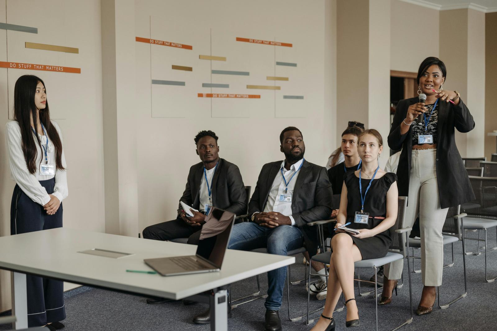 Public Speaking and Presentation (Photo by Pavel Danilyuk: https://www.pexels.com/photo/a-woman-holding-a-microphone-while-talking-8761553/)